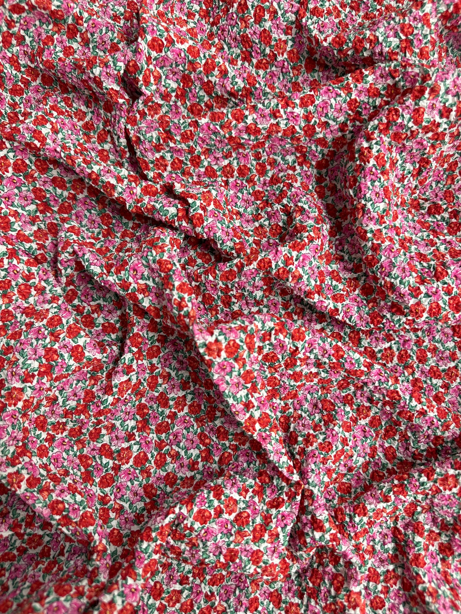 REF-117 LIBERTY FLORAL PRINT STRETCH COTTON SEERSUCKER. ITALY. A CUT OF 7/8 OF A YARD.