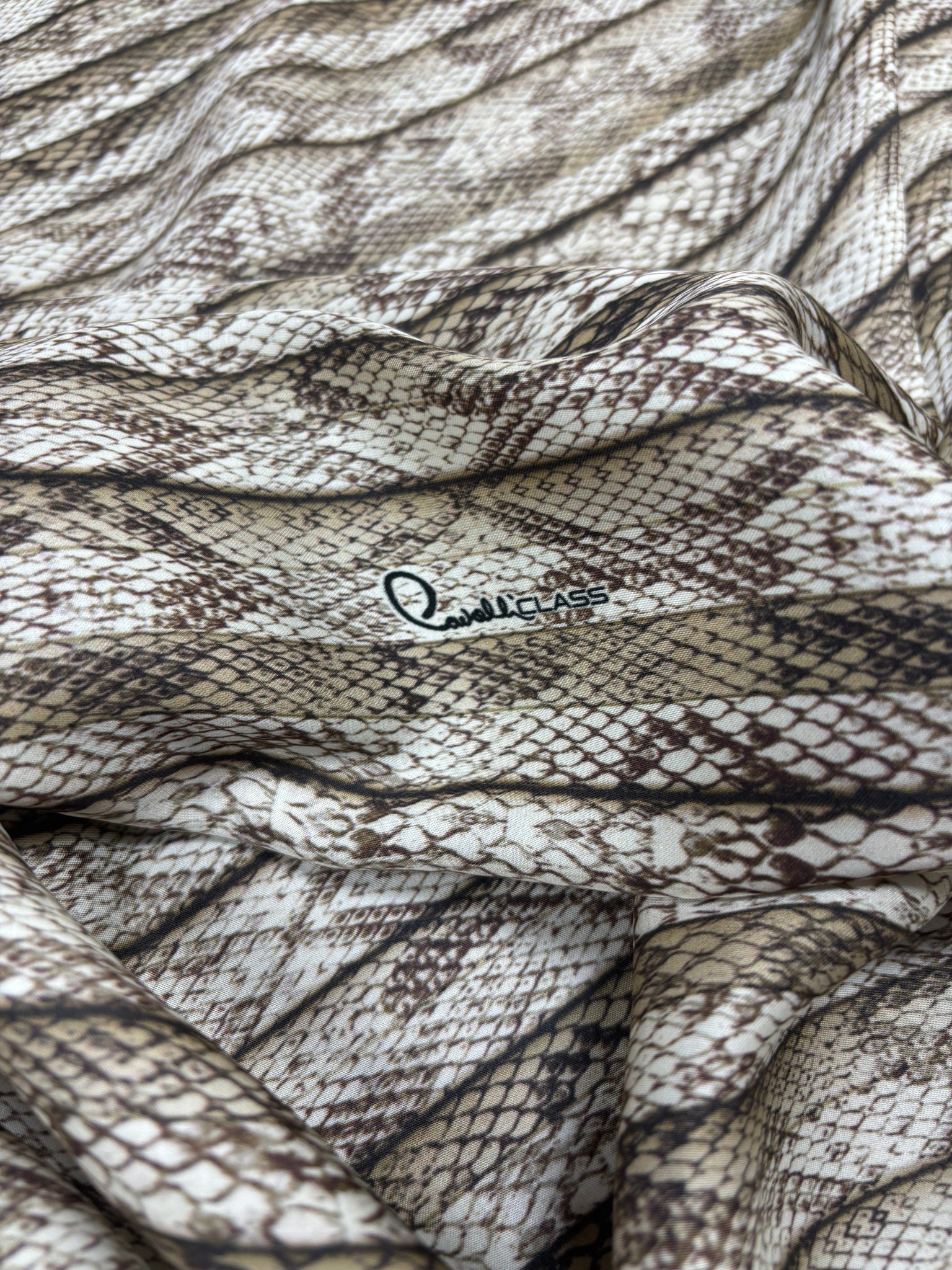 RV-9063W DSIGNER SIGNATURE PYTHON PRINT VISCOSE CHARMESUE. ROBERTO CAVALLI. ITALY.