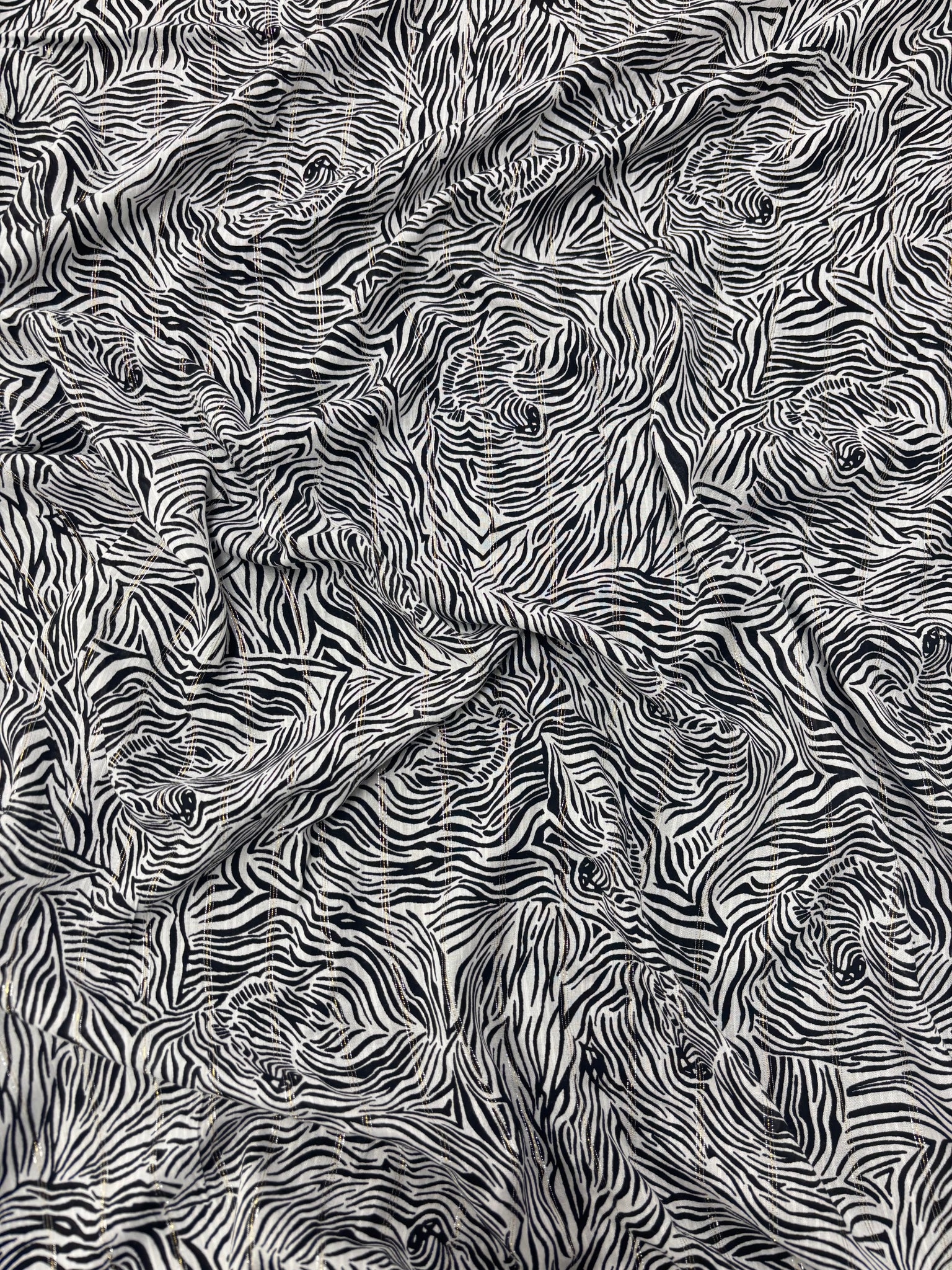 REF-109 ZEBRA PRINT VISCOSE LUREX CHALLIS. ITALY. A CUT OF 3-1/2 YARDS.