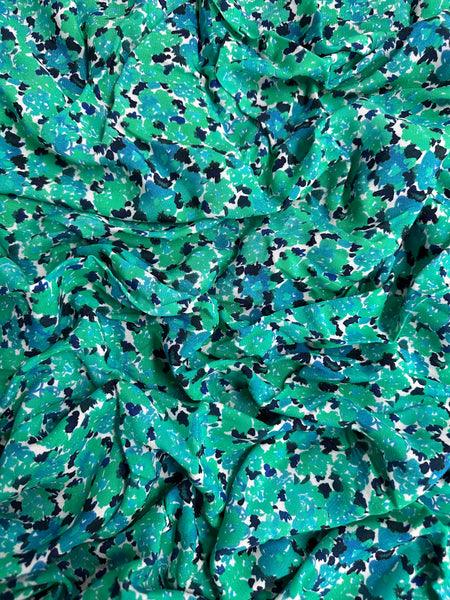 REF-116 FLORAL ABSTRACT PRINT VISCOSE CREPE HAND. ITALY. A CUT OF 7/8 OF A YARD.