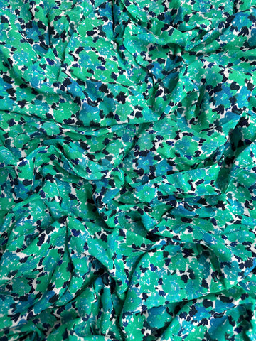 REF-116 FLORAL ABSTRACT PRINT VISCOSE CREPE HAND. ITALY. A CUT OF 7/8 OF A YARD.